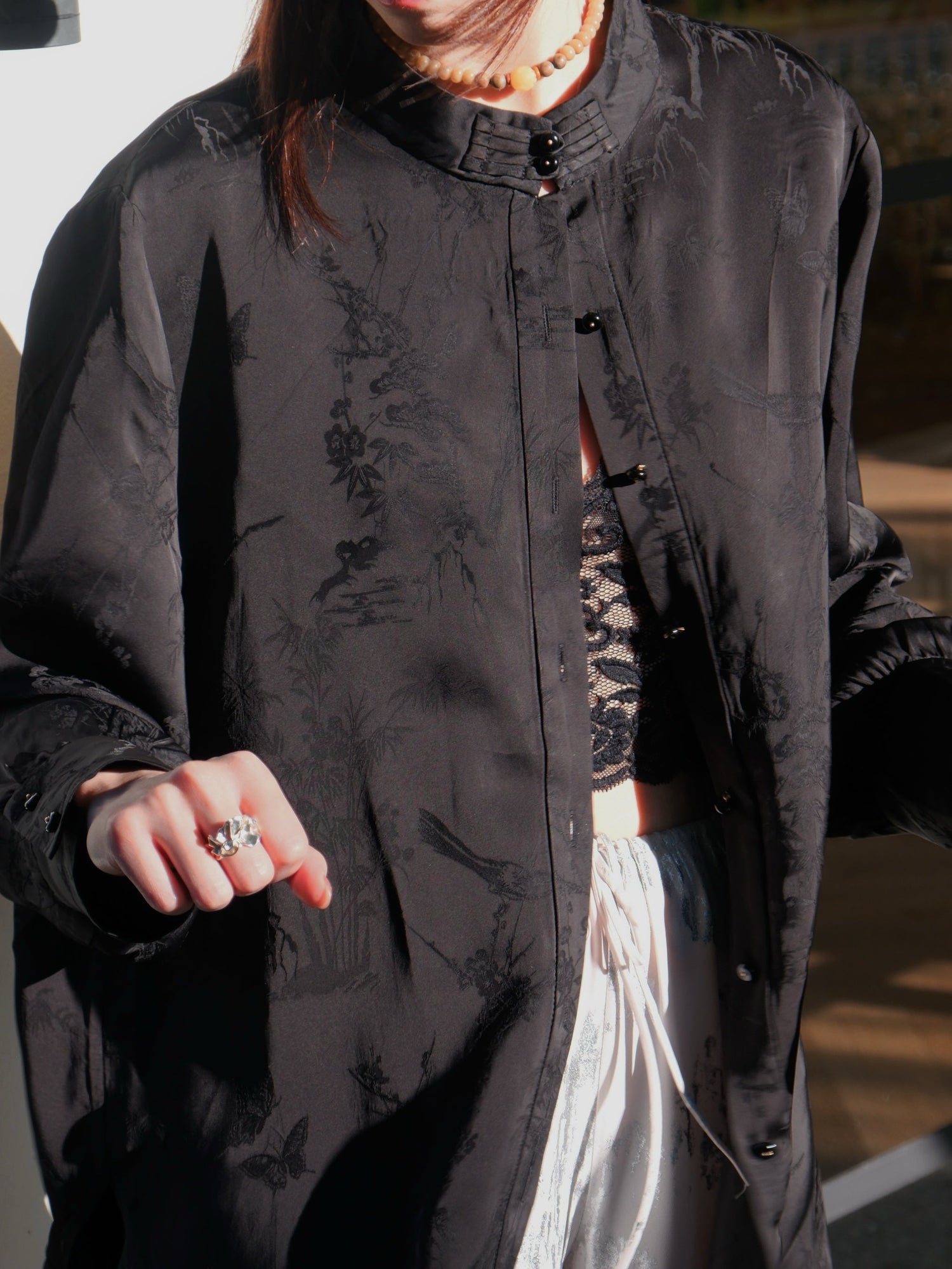 Embroidery and prints, as vital components of traditional craftsmanship, are frequently incorporated into new Chinese style clothing. Traditional patterns meld with modern design styles, preserving cultural depth while offering a striking visual appeal.